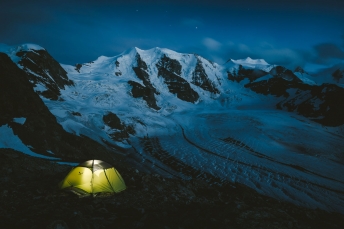 Camping in fron tof the Piz Palue in the Bernina Alps Switzerland.